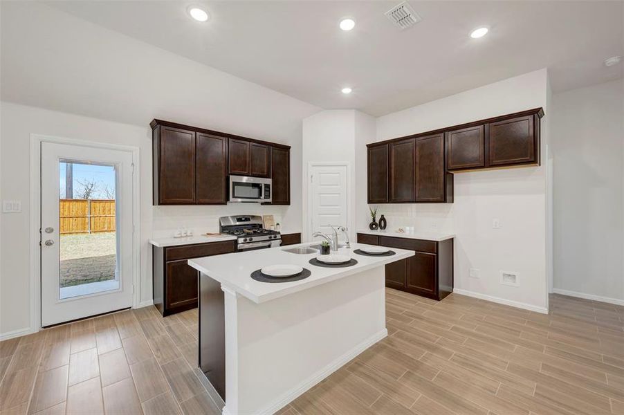 Furnished interior view inside a new home in Sagebrook, Argyle (Image 6). Furnished interior view inside a new home in Sagebrook, Argyle (Image 6).
