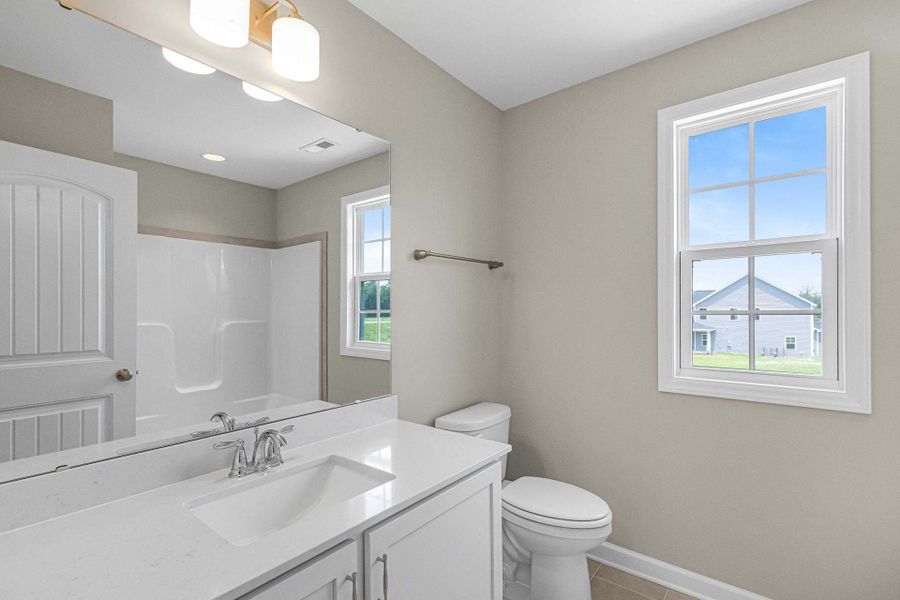 Representative furnished interior of a home built from the Clayton by Caviness & Cates Communities in Bartlett Manor, Youngsville (Image 213).