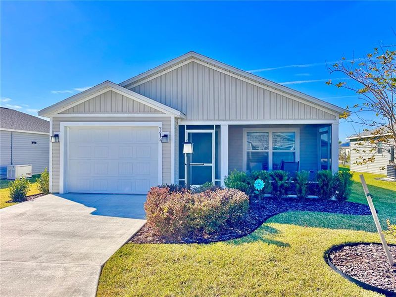 Front exterior of a new home in , The Villages, FL, highlighting curb appeal (Image 1). Front exterior of a new home in , The Villages, FL, highlighting curb appeal (Image 1).