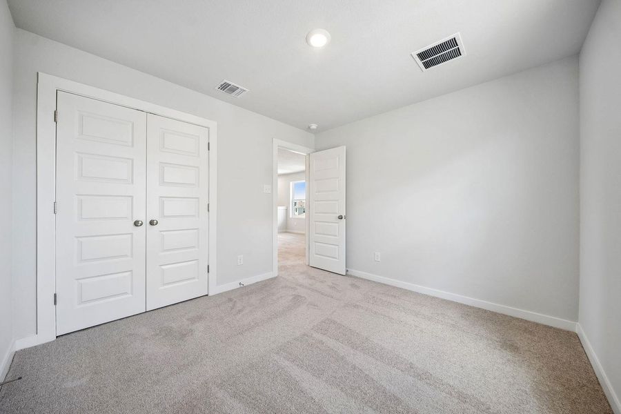 A spacious room offers comfortable carpeting, ready for personalization. A spacious room offers comfortable carpeting, ready for personalization.