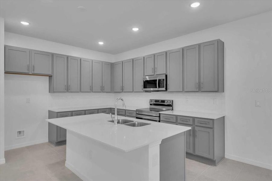 Furnished interior view inside a new home in The Residences at Emerson Park, Apopka (Image 6). Furnished interior view inside a new home in The Residences at Emerson Park, Apopka (Image 6).