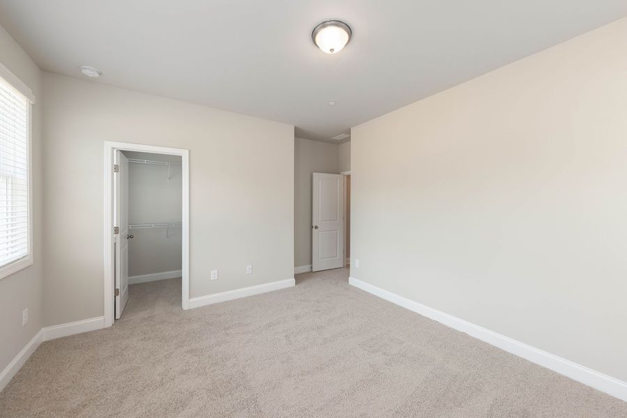 Bedroom #4 has plenty of storage with walk in closet