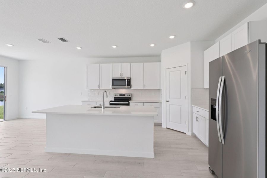 Furnished interior view inside a new home in Cypress Meadows - Signature Series, Jacksonville (Image 11).