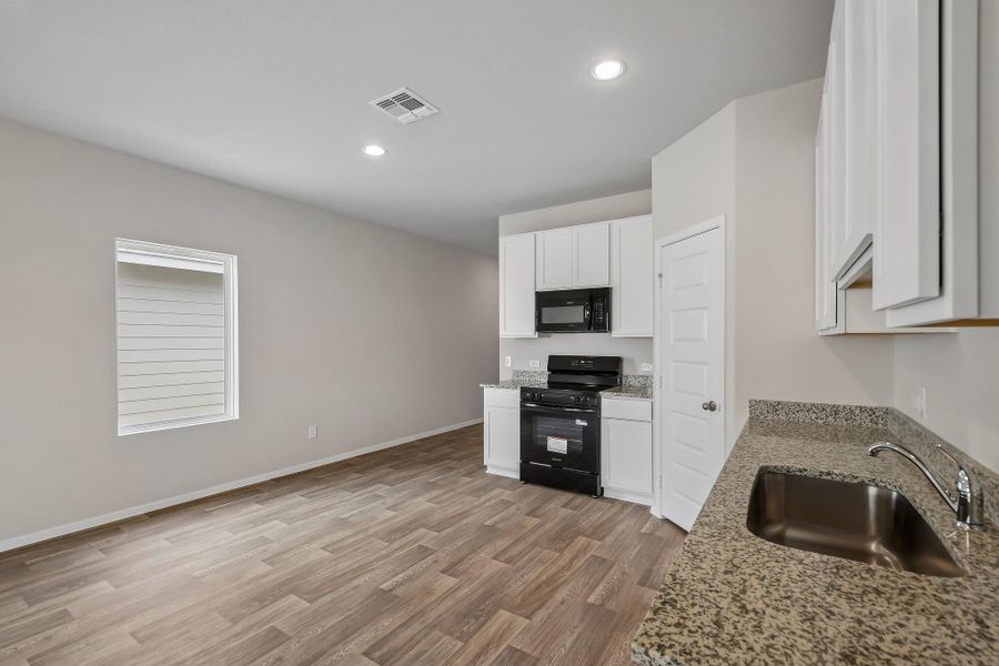 Furnished interior view inside a new home in Edgebrooke, Pflugerville (Image 10).
