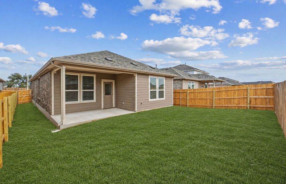 Exterior details and patio area of a home in Crosswinds, Kyle (Image 25).