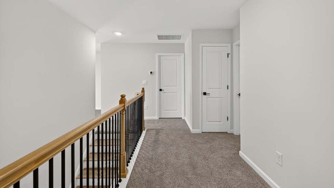 Spacious, unfurnished interior of a new home in Sanctuary at Southgate, Indian Trail (Image 18). Spacious, unfurnished interior of a new home in Sanctuary at Southgate, Indian Trail (Image 18).