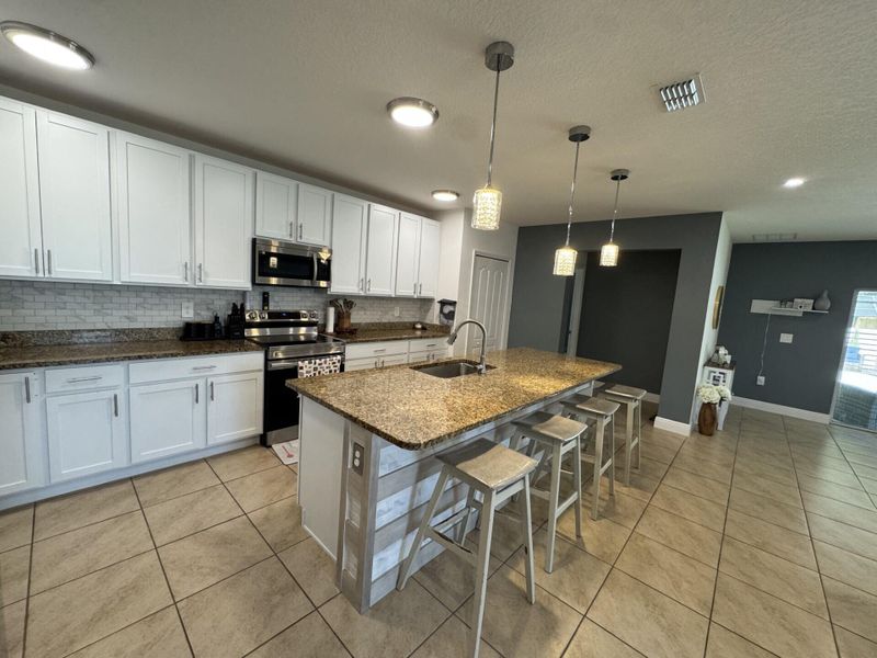 Furnished interior view inside a new home in , Port St. Lucie (Image 4).