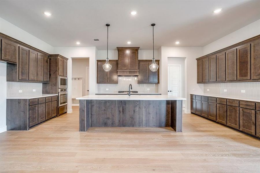 Furnished interior view inside a new home in Waterfall Ranch, Waxahachie (Image 4).