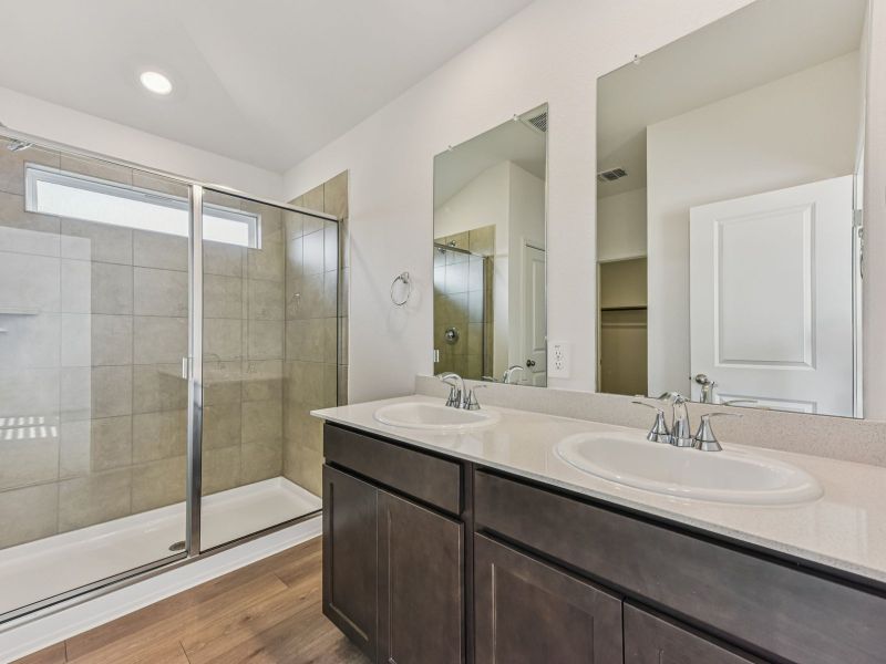 Furnished interior view inside a new home in Riverbend at Double Eagle - Reserve Collection, Cedar Creek (Image 6).