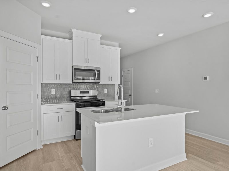 Furnished interior view inside a new home in Northbrook Village Townes, Taylors (Image 4).