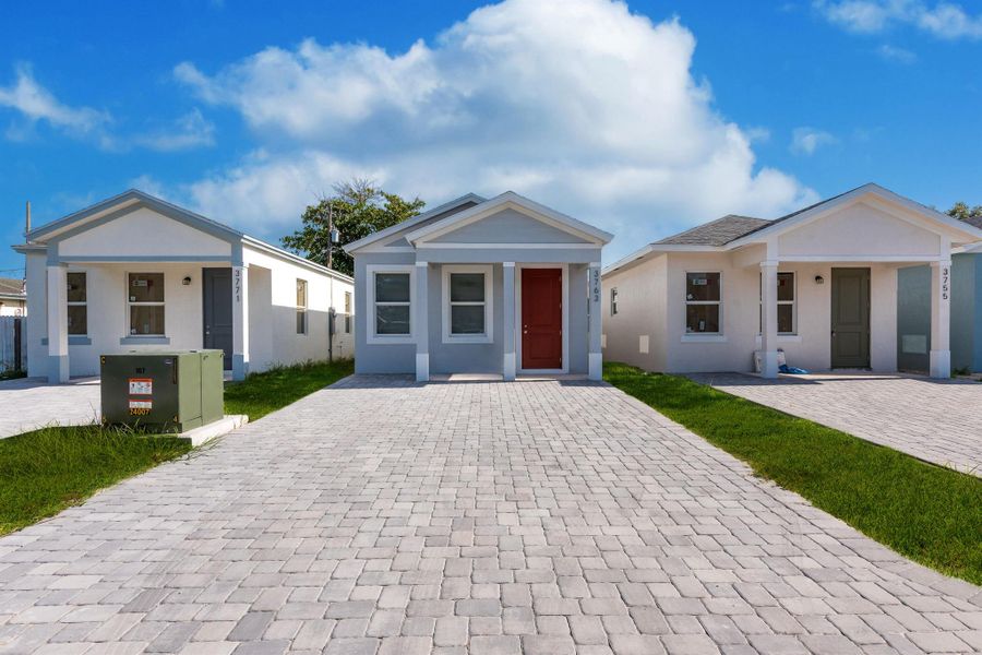 Front exterior of a new home in , West Palm Beach, FL, highlighting curb appeal (Image 23).