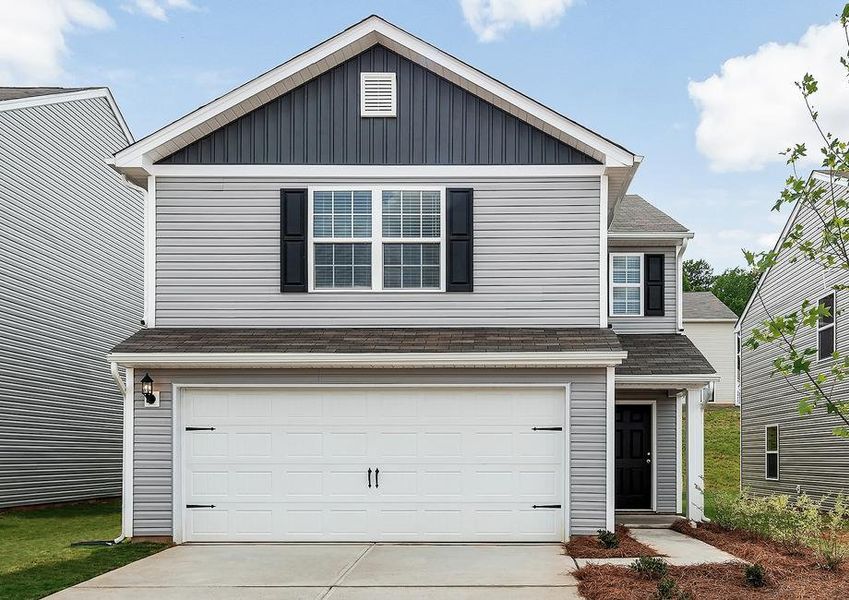 Two-story Ashley with vinyl siding and shutters.