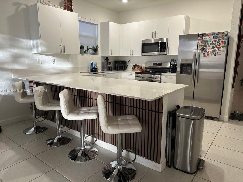 Furnished interior view inside a new home in Beacon at Galiano Pointe, Miami (Image 3).