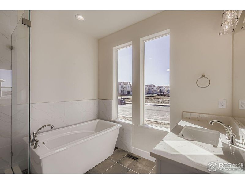 Furnished interior view inside a new home in RainDance, Windsor (Image 7).