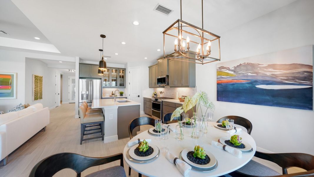 Representative furnished interior of a home built from the Meadow Brook by Neal Communities in SkySail, Naples (Image 14).