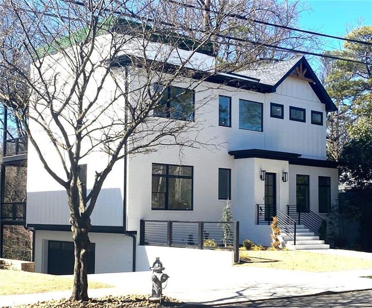 Front exterior of a new home in , Atlanta, GA, highlighting curb appeal (Image 2).