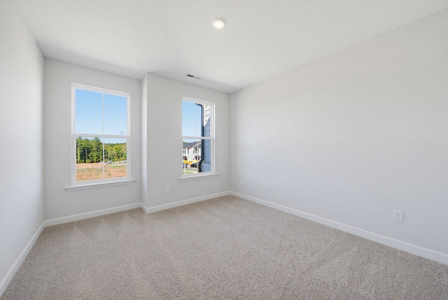 Spacious, unfurnished interior of a new home in Sweetbrier, Durham (Image 23).