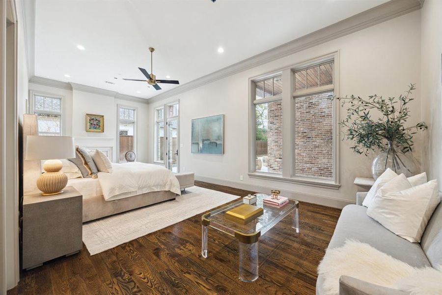 Step into the primary bedroom of your dreams! This serene retreat features soaring ceilings, abundant natural light, and a seamless connection to the outdoors.