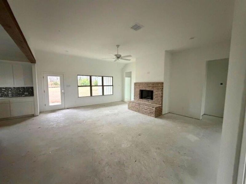 Living area with woodburning fireplace Living area with woodburning fireplace