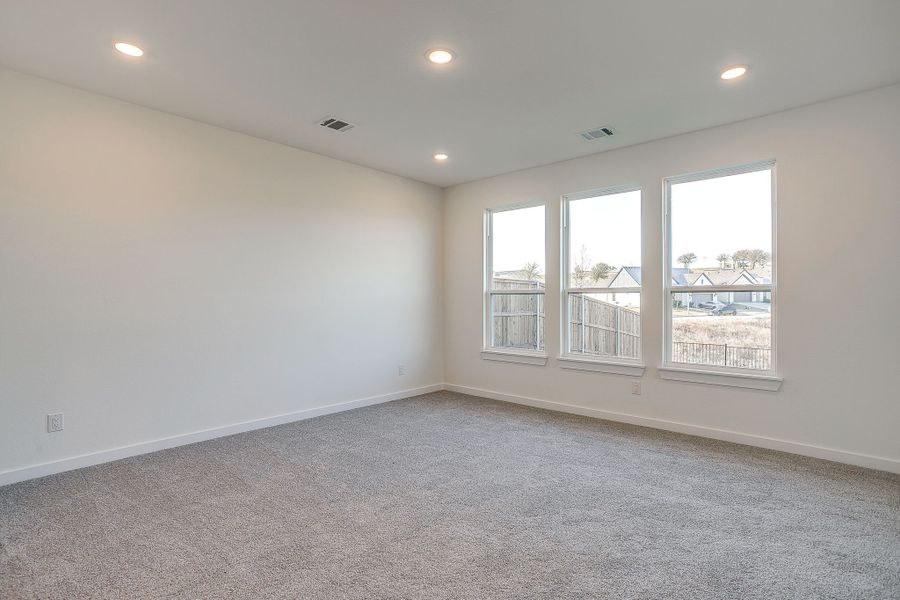 Representative unfurnished interior of a home built from the Palmer by Graham Hart Home Builder in Bear Ridge, Burleson (Image 20).