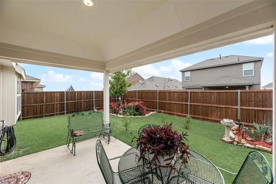 Exterior details and patio area of a home in Walden Pond, Forney (Image 4).