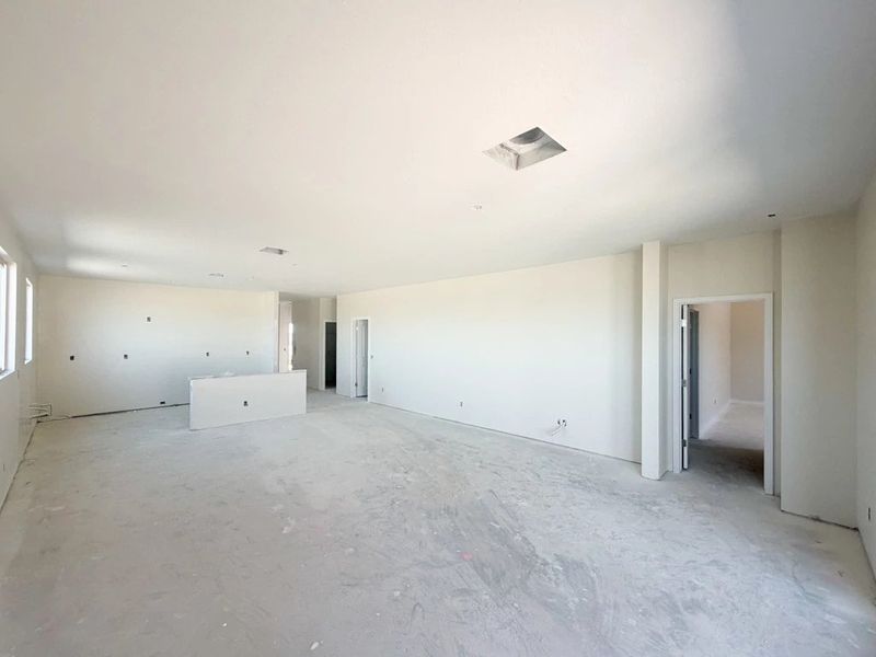 Great room, dining and kitchen Great room, dining and kitchen