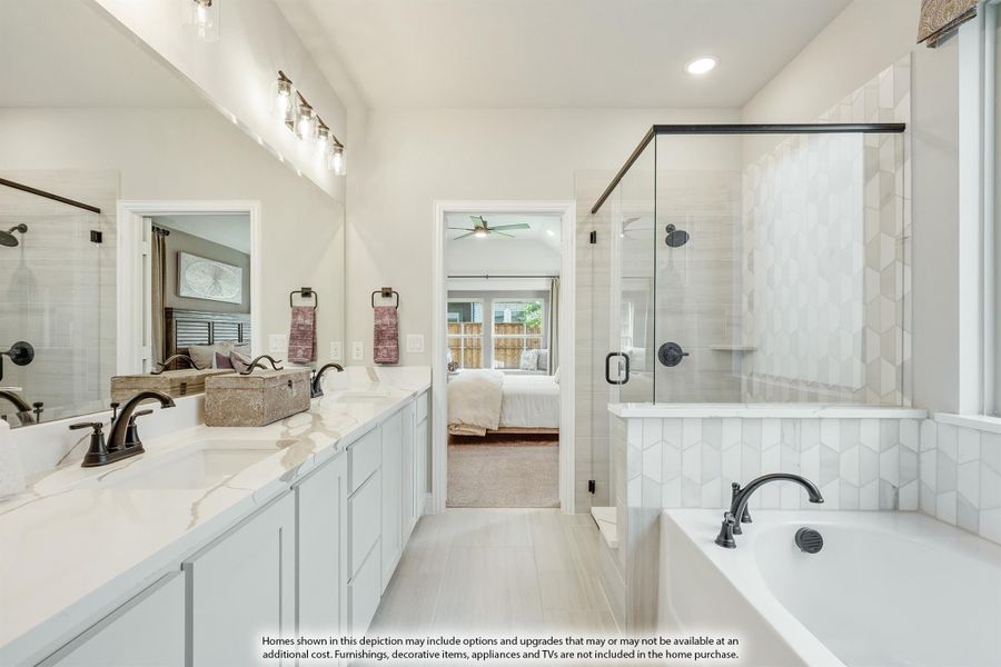 Master bathroom with double vanity, soaking tub, glass shower, and white tile walls connecting to bedroom Master bathroom with double vanity, soaking tub, glass shower, and white tile walls connecting to bedroom