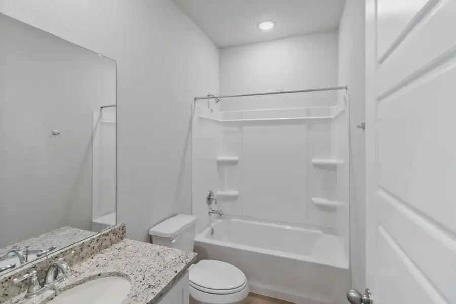 Representative furnished interior of a home built from the Duplex 1676 by TwoTen Communities in Amanda Park, San Antonio (Image 13).