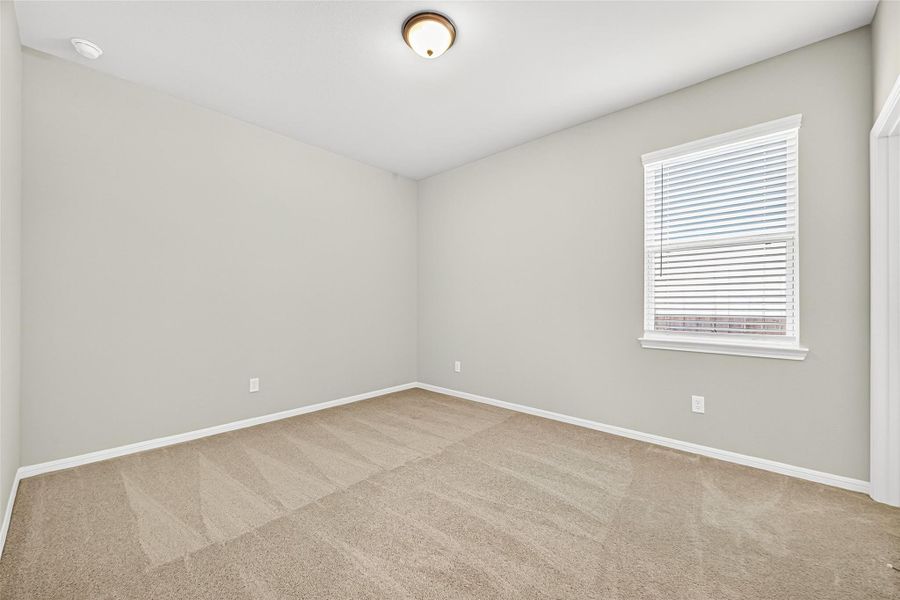 Spacious, unfurnished interior of a new home in Sunterra, Katy (Image 38).