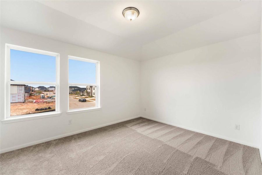 Spacious, unfurnished interior of a new home in Sunterra, Katy (Image 30).