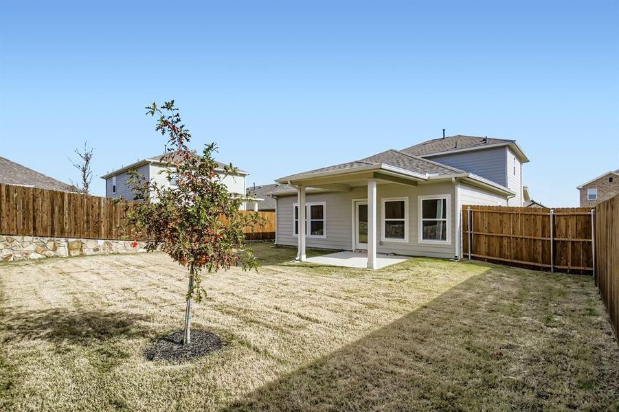Exterior details and patio area of a home in Ambergrove, Royse City (Image 19).