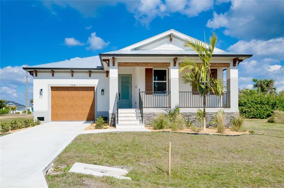Front exterior of a new home in , Punta Gorda, FL, highlighting curb appeal (Image 28). Front exterior of a new home in , Punta Gorda, FL, highlighting curb appeal (Image 28).