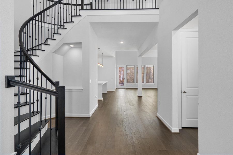 Foyer featuring dark wood-type flooring and recessed lighting Foyer featuring dark wood-type flooring and recessed lighting