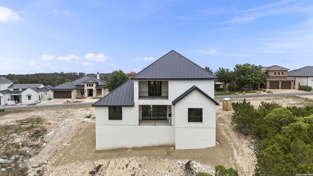 Front exterior of a new home in , Boerne, TX, highlighting curb appeal (Image 29).