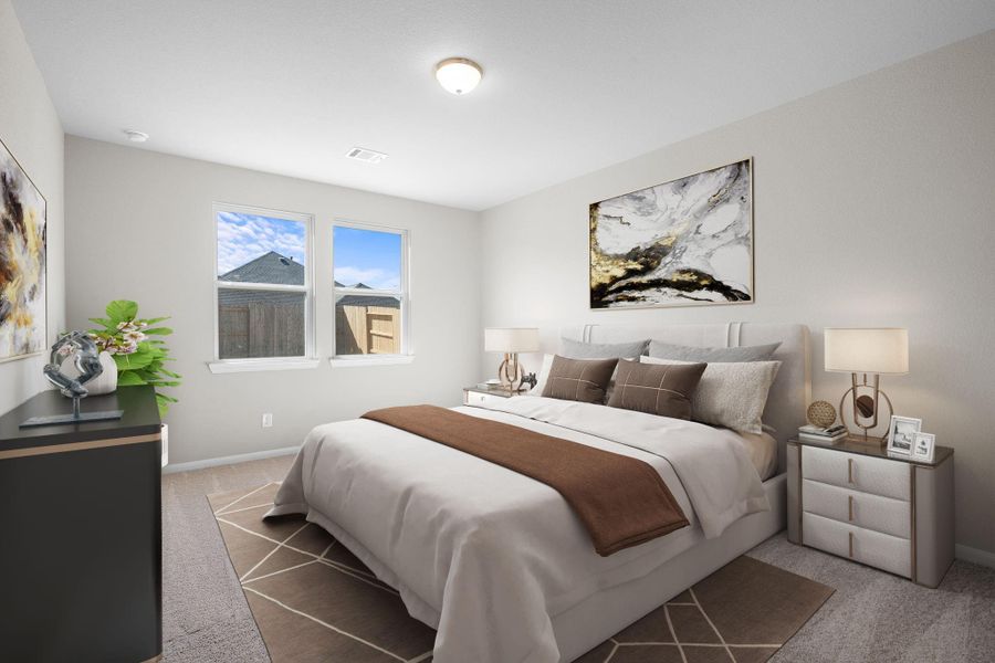 The primary bedroom is generously sized, creating a tranquil and spacious retreat that offers ample room for relaxation. Featuring plush carpet, high ceilings, fresh paint, and large windows that lets in natural lighting throughout the day.