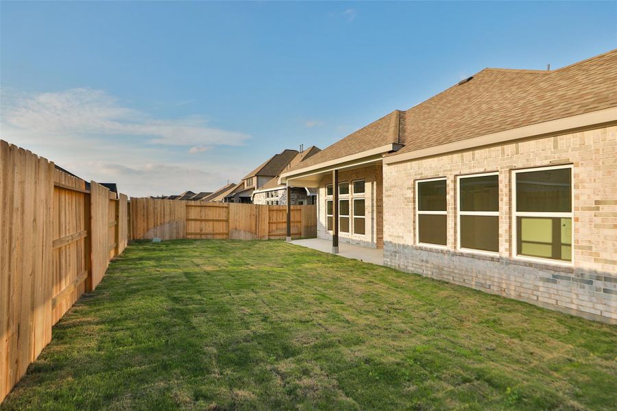 Exterior details and patio area of a home in Brookewater, Rosenberg (Image 20).