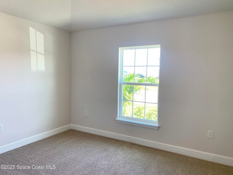 Spacious, unfurnished interior of a new home in St. John Preserve, Palm Bay (Image 9). Spacious, unfurnished interior of a new home in St. John Preserve, Palm Bay (Image 9).