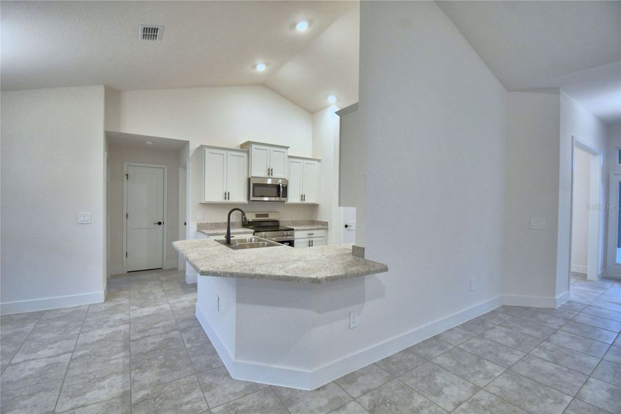 Furnished interior view inside a new home in Cadence Crossing, Auburndale (Image 5).
