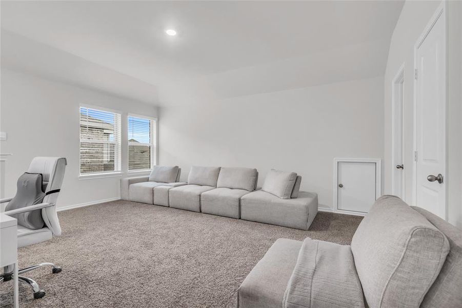 Carpeted home office featuring vaulted ceiling, baseboards, and recessed lighting Carpeted home office featuring vaulted ceiling, baseboards, and recessed lighting