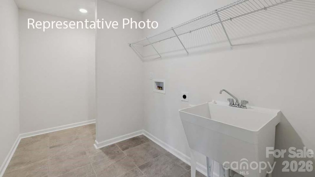 Spacious, unfurnished interior of a new home in Sanctuary at Southgate, Indian Trail (Image 19).