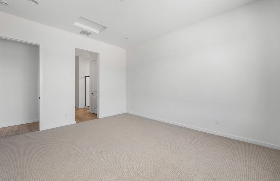 Spacious, unfurnished interior of a new home in Legado West, Queen Creek (Image 23).