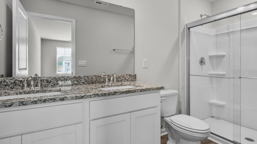 Furnished interior view inside a new home in Waterside Townhomes, Surf City (Image 9).