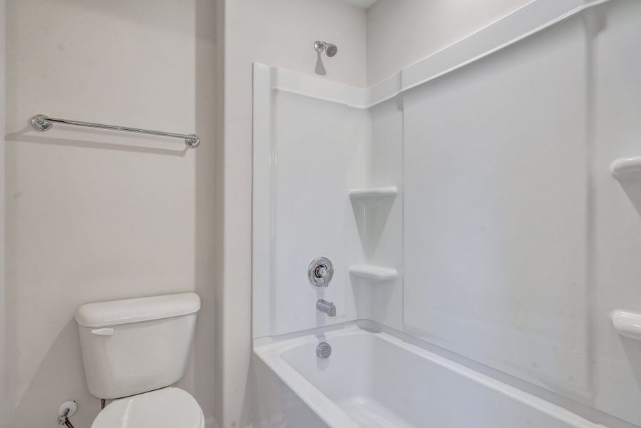 Representative furnished interior of a home built from the The Stonecrest by Smith Family Homes in Ramsey Landing, Rincon (Image 18).