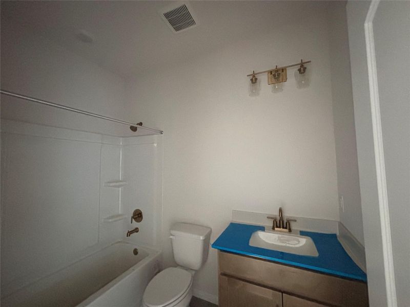 Furnished interior view inside a new home in Covered Bridge, Hutto (Image 4).