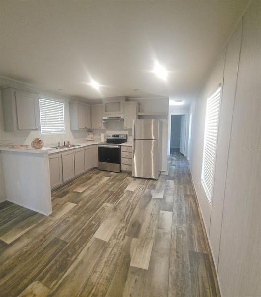 Spacious, unfurnished interior of a new home in , Lake City (Image 11).