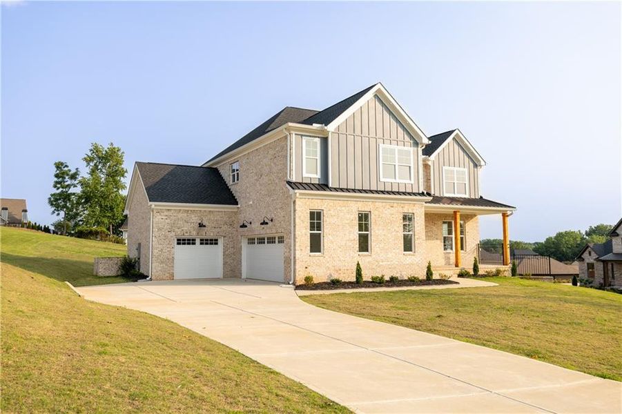 Front exterior of a new home in , Jefferson, GA, highlighting curb appeal (Image 26).