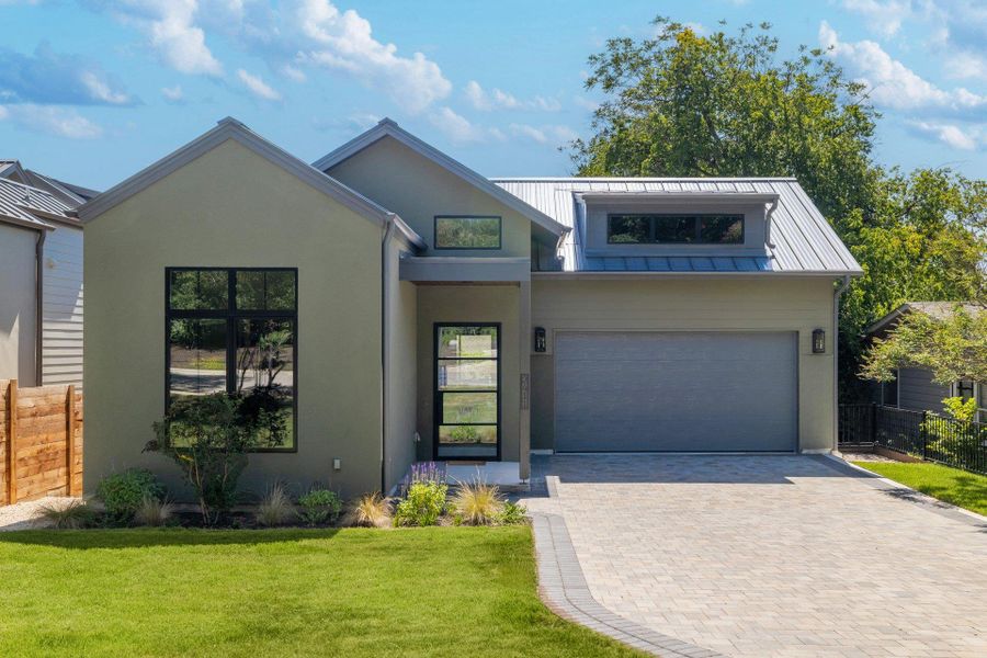 Front exterior of a new home in , Austin, TX, highlighting curb appeal (Image 21). Front exterior of a new home in , Austin, TX, highlighting curb appeal (Image 21).