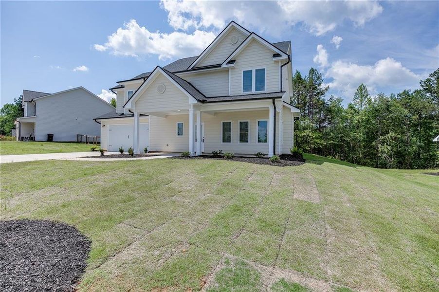 Front exterior of a new home in , Toccoa, GA, highlighting curb appeal (Image 2). Front exterior of a new home in , Toccoa, GA, highlighting curb appeal (Image 2).