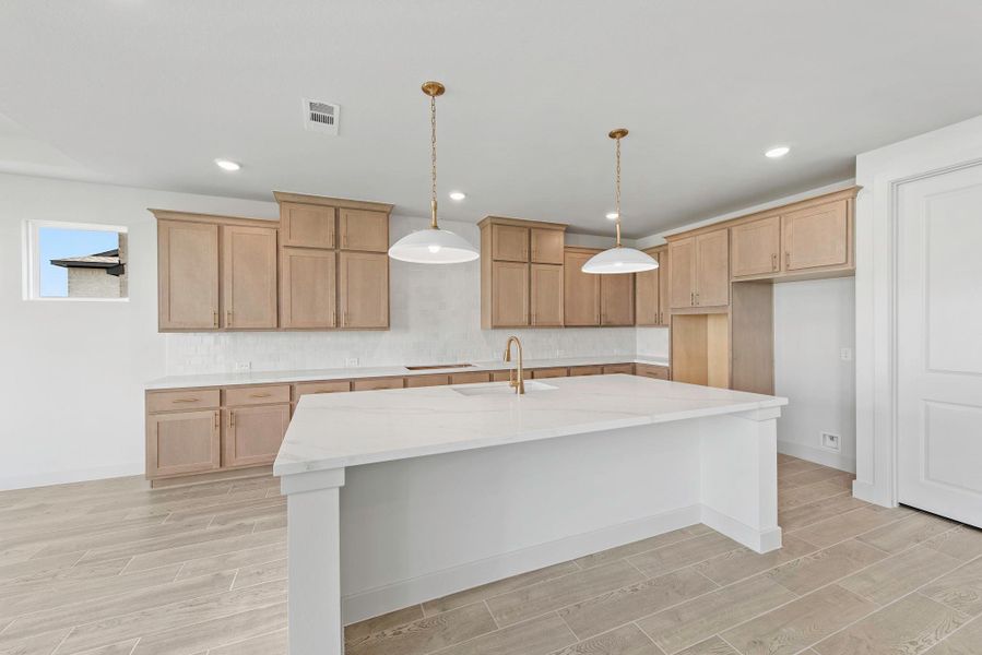 Furnished interior view inside a new home in Bridgeland, Cypress (Image 4).