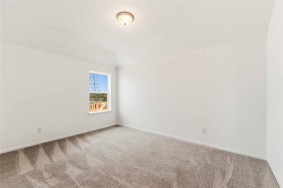 Spacious, unfurnished interior of a new home in Sunterra, Katy (Image 29).